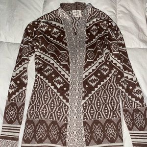 It’s a brown cardigan very cute 🌙